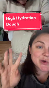 Reply to @therealdy5 this is a high hydration dough. The bench knife is an  extension of your hand. #Baking #BreadTok #BakingTikTok #Sourdough #Chef