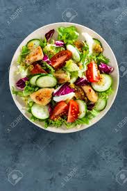 Fresh Vegetable Salad Of Tomatoes Cucumbers Italian Mix Lettuce Stock Photo Picture And Royalty Free Image Image 97351777