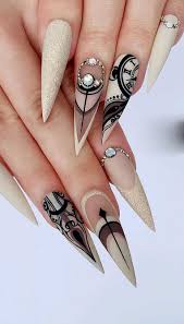 You should stay updated with latest nail art designs, nail colors, acrylic nails, coffin nails, almond nails, stiletto nails, short nails, long nails, and try different nail designs. 22 Long Acrylic Nail Design In Stiletto And Coffin Shapes Women World Blog