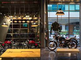 Royal Enfield Store By Lotus New Delhi India Retail Design Blog Motorcycle Showroom Design Motorcycle Showroom Motorcycle Garage