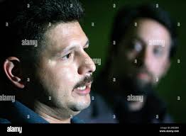 Joe Seifert, right, the son of Daniel Seifert who was murdered in September  1974, and Anthony Ortiz, the son Richard D. Ortiz, who was killed in July  1983, meet with reporters at