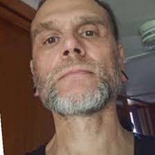 Bio char and hardwood ash for invasive grass seed denaturation in composting