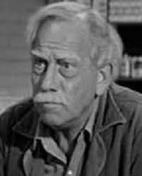 Douglas was pear-shaped, very short, and stood the whole way"