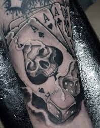 Here is another great tattoo for men. 75 Dice Tattoos For Men The Gambler S Paradise Of Life Playing Card Tattoos Dice Tattoo Card Tattoo Designs