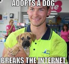 It Wasn T Long Before The Photo Turned Into A Meme With Raffa S New Owner Ben Becoming Known As Ridiculously Photogenic Adoption Guy Puppy Adoption Dog Adoption Puppy Photos