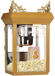 This nostalgic looking popcorn cart resembles the late 1800's to early 1900's corner vendor style carts and is just under 5 feet in height. Gold Medal 2660gt Antique 6oz Counter Popcorn Machine