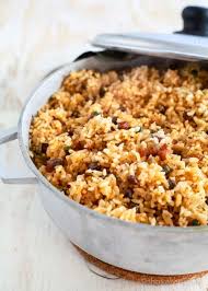 Flavorful puerto rican rice and beans simmered in a sauce of sofrito and tomato along with potatoes and olives. Arroz Con Gandules How To Make Puerto Rican Rice And Pigeon Peas