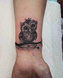 77 fantastic wrist key tattoos design; 48 Best Owl Tattoos On Wrist