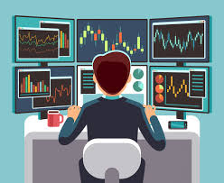 stock market trader looking at multiple computer screens