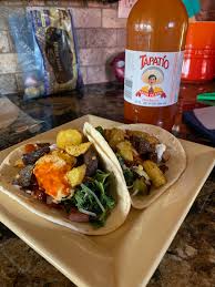 Touch device users, explore by touch or with swipe gestures. Roasted Potatoes Chopped Ham Arugula Cheese Tapatio I Finally Found A Page To Share All My Taco Love Tacos