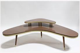 I have the coffee table and an end table. Table Coffee Table Vintage Corner Kidney Boomerang Shape 2 Levels W Smaller Shelf 3 Legs Brass Capped Feet Trim Laminate Brown Vanprop Ca