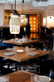 Diy Rope Wrapped Mason Jar Lights Collective Gen Mason Jar Lighting Jar Lights Mason Jar Light Fixture