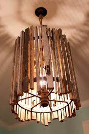 8 Easy Diy Light Fixtures The Budget Decorator Diy Light Fixtures Diy Pendant Light Wood Lamp Design