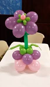 Inflate the 5″ balloons 6 pumps, then tie them together to form a duplet. Flower Centerpiece Christmas Balloon Decorations Balloon Centerpieces Birthday Balloons