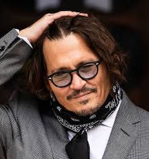 Johnny Depp scores rare victory over Amber Heard's $10m divorce settlement  pledge