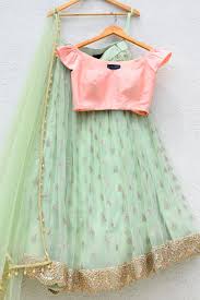 Mint Green Lehenga With Peach Pink Blouse Viva Luxe Green Lehenga Mint Green Outfits Green Blouse Designs