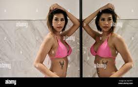 Fun in the tub non-nude Young Lady blowing bubbles in a tub of Bubble Bath  Mirror Shot Stock Photo - Alamy