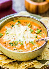 This Creamy Cheesy Chicken Enchilada Soup Is A Fiesta Of Flavors Full Of Chunks Of Chicken Bla Cheesy Chicken Enchiladas Enchilada Soup Chicken Enchilada Soup