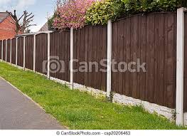 Sure, wooden fences can add bucolic charm and rustic appeal to your yard; Close Board Fencing Panels Close Board Fence Erected Around A Garden For Privacy With Wooden Fencing Panels Concrete Posts Canstock