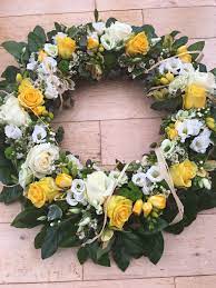 Overall, these flowers are widely accepted as funeral flowers in most countries. Yellow And White Sympathy Flowers Funeral Wreath Country Style Flowers Yellow Roses Eustoma Freesi Funeral Flowers Remembrance Flowers Flower Arrangements