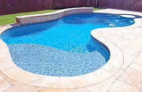 Free Form Pool Ideas Shapes And Pictures Blue Haven Backyard Pool Landscaping Backyard Pool Pools Backyard Inground