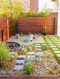 Anchor your garden with a pretty walkway and savor the rewards of all that digging, planting and weeding. This Los Angeles Rock Garden By Warwick Hunt Exudes A Strong Zen Vibe It Amp 039 S Filled With Backyard Garden Design Zen Rock Garden Small Backyard Gardens