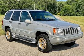 Image result for Medium Driftwood 1996 Chrysler