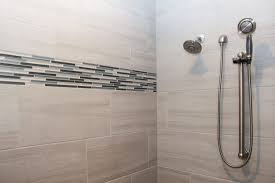 Floor & decor has top quality accent wall tile at rock bottom prices. Beige Tile Shower Black Beige And Grey Glass Tile Accent Wall Shower Tile Glass Tile Shower Shower Accent Tile