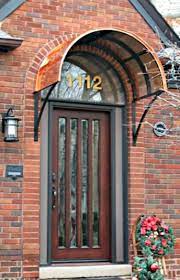 The Copper Eyebrow Awning With The Smith Scrolls In Royal Oak Mi Door Awnings Beautiful Doors Metal Awning