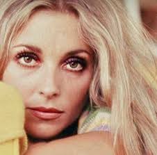 Sharon combing her hair in front of the mirror (footage-1968)