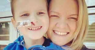 Mum shares heartbreaking pictures of son, six, as he battles rare disease  linked to Covid-19