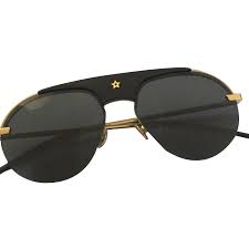 La maison de couture se distingue par une grande inventivité teintée d'une pointe d'impertinence. Lunettes Christian Dior Lunettes De Soleil Metal Noir Ref 84463 Joli Closet