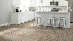 Realistic Wood Look Porcelain Tile In Kitchen Setting Kitchen Flooring Wood Look Tile Floor Home Decor Kitchen