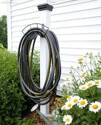 How To Make An Easy Diy Hose Stand Hello Farmhouse Garden Hose Holder Diy Garden Projects Garden Hose Storage