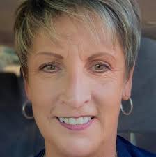 Should I paint the hearth the same grey as the rest of the brick?