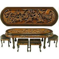 We are proud to offer over 300+ unique living room accent tables; Chinese Oval Coffee Table With Hand Carved Battle Scene And Six Stools For Sale At 1stdibs