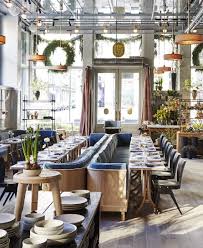Roman And Williams Open A Soho Flagship Florist And French Cafe Included Goop Cafe Interior Design Modern Restaurant Cafe Design