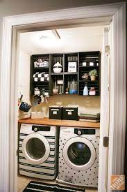 This small laundry room designed by gail davis is bursting with personality, from the colorful wallpaper, to the framed artwork, blue trim, and striped penny tile floors. 25 Small Laundry Room Ideas Budget Laundry Room Makeover Laundry Room Diy Laundry Room Makeover