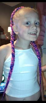 Who does hair extensions in Blue Springs?