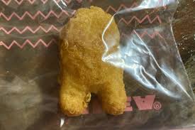 Using wet hands, shape the chicken into nuggets and coat them in the cornflour. A Very Sus Chicken Nugget Shaped Like An Among Us Crewmate Sells For 99 997 On Ebay The Verge