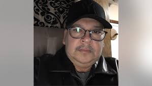 Janitors call for added compensation after one of their own dies of  COVID-19