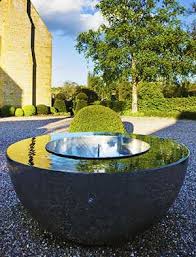 Modern water features add an air of sophistication to a garden and because of their shapes they can also bring zen to your outdoor living space especially our asian inspired fountains. Garden Water Features Uk Stainless Steel Water Walls Water Fountains David Harber