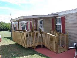 Mobile home porches are often screened in, especially in the southern us states. Pin By Bonnie On Stuff Mobile Home Porch Porch With Ramp Mobile Home Siding