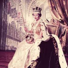 This white satin dress was designed by british fashion designer norman hartnell. Queen Elizabeth Coronation Dress Popsugar Fashion