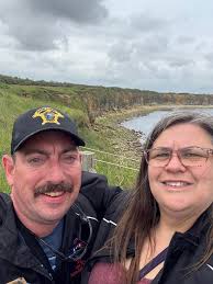 This is Stacey Knapp & I At Pointe du Hoc, Omaha Beach. I can't imagine the  amount of danger that the 2nd Ranger Battalion had climbing ROPE LADDERS  while being shot at