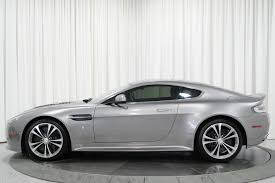 Image result for Lightning Silver 2011 Aston Martin