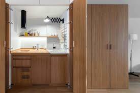 A new decade means we may still be seeing stained and painted woods in this year's kitchen designs, but we're also seeing untreated wood beams can be a real showstopper, especially when contrasting against a light kitchen. How To Design A Hidden Kitchen Archdaily