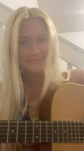 Daughter's musical growth from Norfolk, VA farmers market to solo songwriter