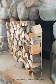 How To Make A Faux Stack Of Logs Pineapple Hill Interiors Fireplace Facade Diy Fireplace Fireplace Cover