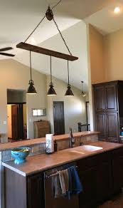 If you include chandeliers within the pendant light category, this type of light is probably the most popular ceiling lighting option for kitchen islands. How To Make An Interesting Art Piece Using Tree Branches Ehow Vaulted Ceiling Kitchen Vaulted Ceiling Lighting Kitchen Remodel